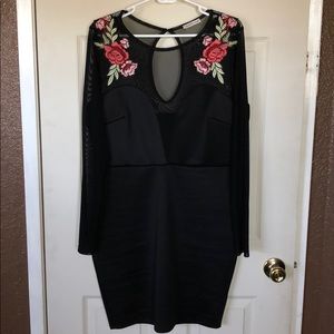 Plus size black and floral dress
